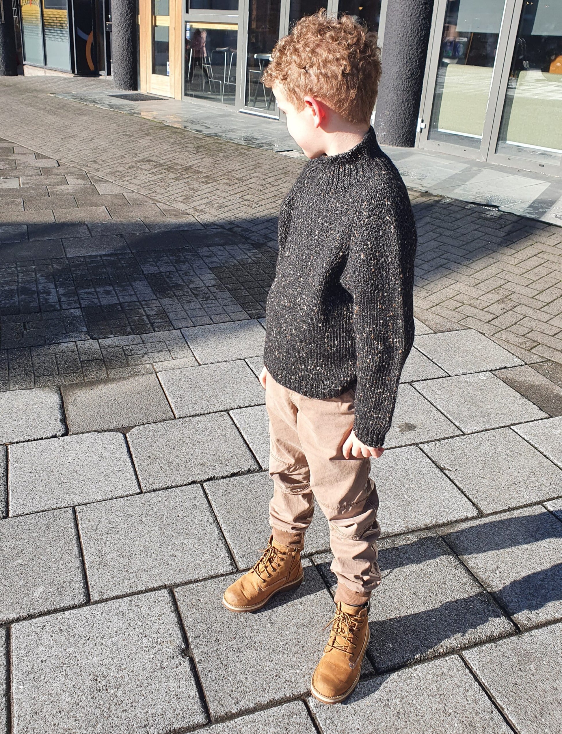 Boy wearing textured yoke raglan knitted sweater Duggari