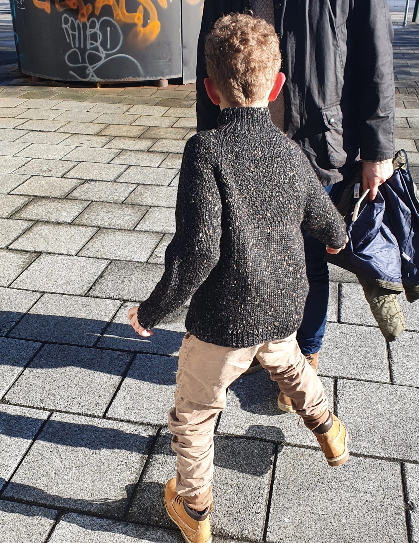 Boy wearing textured yoke raglan knitted sweater Duggari