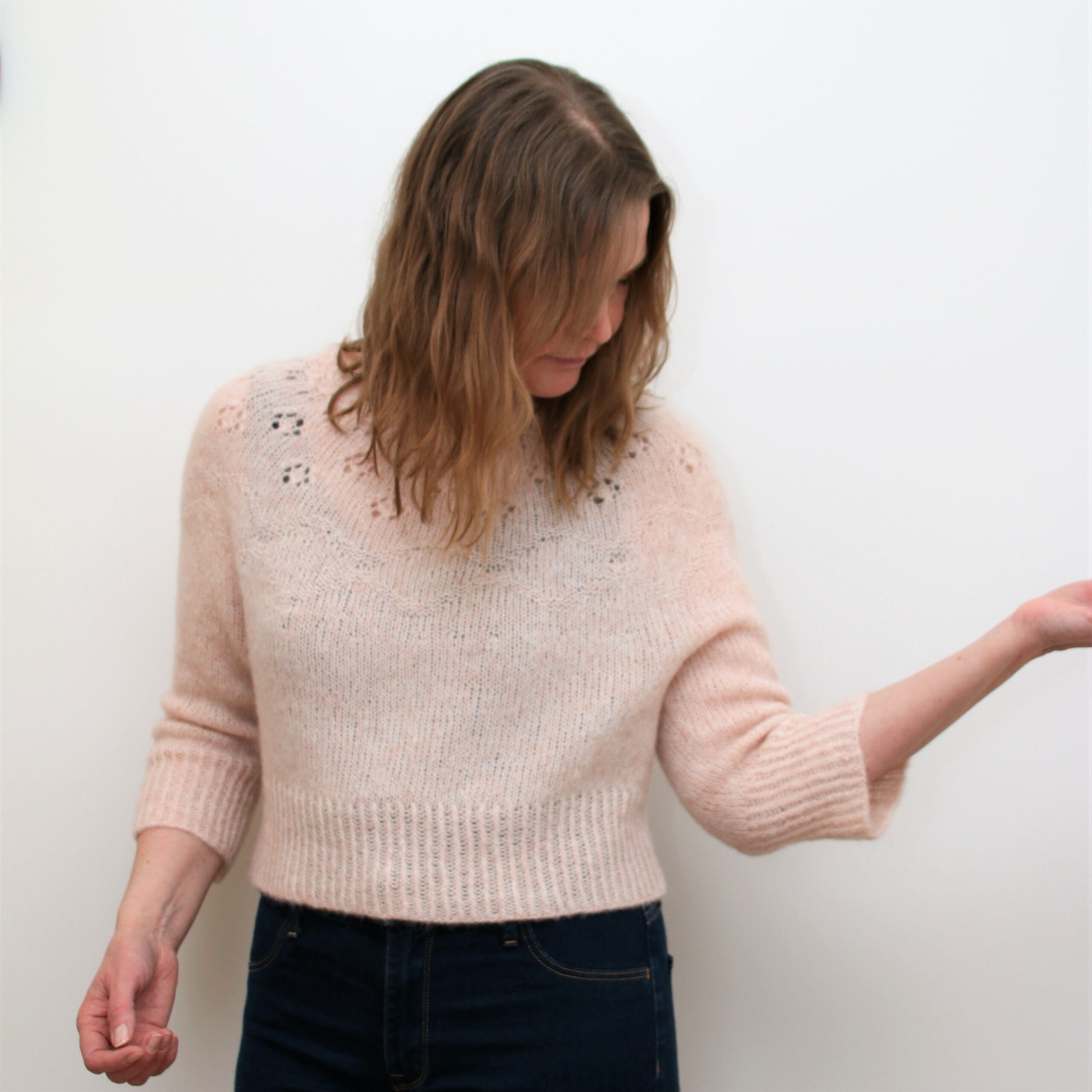 Soft feminine top-down sweater with textured and openwork yoke detail, knitted in light and airy yarn