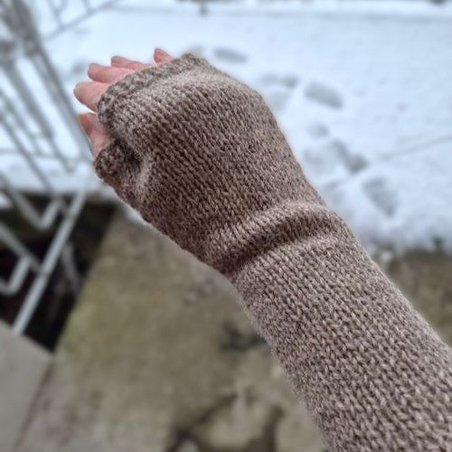 Close up of timeless practical knitted hand warmers.